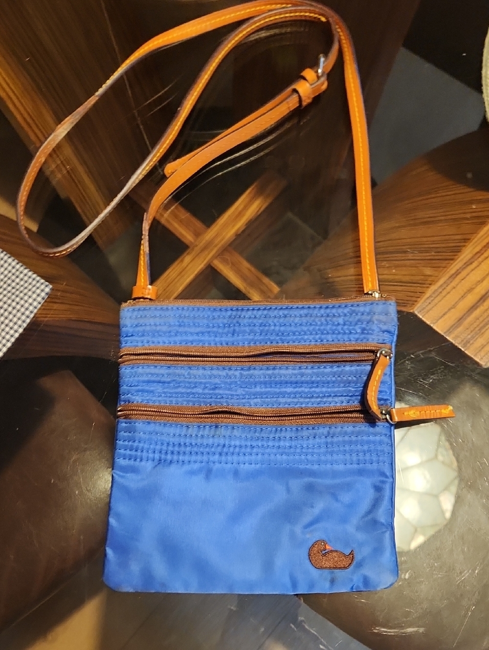 DOONEY AND BOURKE Sky Blue Crossbody Bag with Embroidered Duck Accent. Good Used